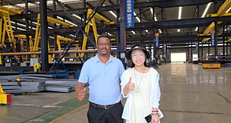 Warmly welcome the Ethiopian client of the noodle factory project to visit the factory of BY Steel Structure Group!